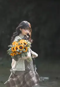 Youthful Beauty: A Gentle Girl Embracing Radiant Sunflowers-5