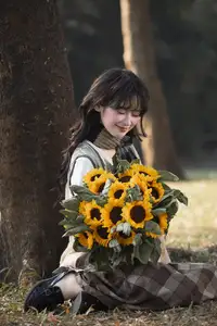 Youthful Beauty: A Gentle Girl Embracing Radiant Sunflowers-8