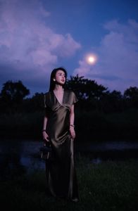 Enigmatic Beauty Under Full Moonlight: Woman in Elegant Silk Gown, A Dreamlike Night Moment.-5