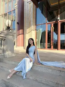 Miss Ý Nhi Radiates Elegance: A Vision in Her Sophisticated Evening Gown on Grand Ancient Stairs-4