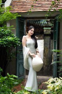 Graceful Vietnamese Girl in Traditional Conical Hat-3