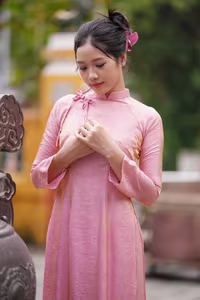 VGU No.136: The Graceful Pink Ao Dai: Vietnamese Beauty Embracing Tradition and Serenity-13