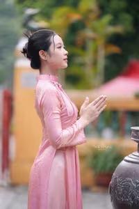 VGU No.136: The Graceful Pink Ao Dai: Vietnamese Beauty Embracing Tradition and Serenity-11