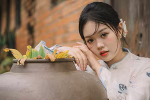 XVG No.29: Graceful Ao Dai - Unveiling the Serene Beauty of a Vietnamese Woman with Golden Blooms.-16