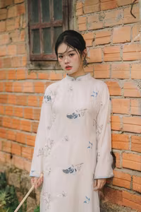 XVG No.29: Graceful Ao Dai - Unveiling the Serene Beauty of a Vietnamese Woman with Golden Blooms.-3