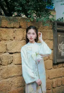 Captivating Asian Beauty: Elegant Woman Embracing Delicate Flowers-2