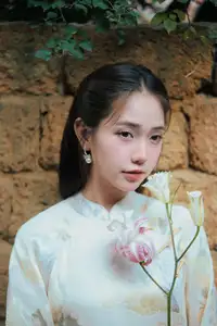 Captivating Asian Beauty: Elegant Woman Embracing Delicate Flowers-0