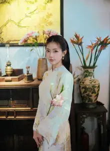 Captivating Asian Beauty: Elegant Woman Embracing Delicate Flowers-3