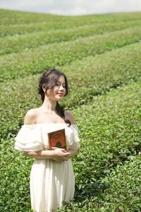 Serene Girl Embracing Nature & Book in Lush Green Tea Hill-3