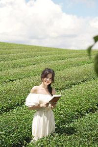 Serene Girl Embracing Nature & Book in Lush Green Tea Hill-4