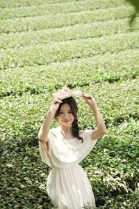 Serene Girl Embracing Nature & Book in Lush Green Tea Hill-8