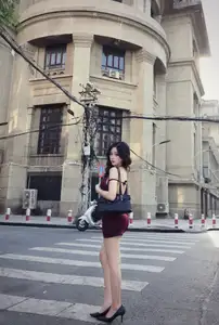 Charming Woman in Elegant Burgundy Mini Dress Defines Urban Street Style-6