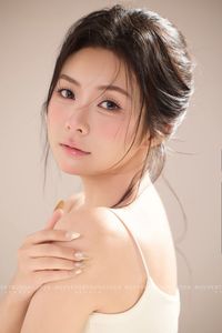 Close-up Portrait of a Woman with Natural Beauty and Gentle Expression-0