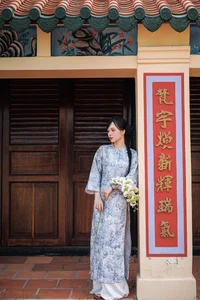 Timeless Grace in Blue Floral Ao Dai and Ancient Architecture-2