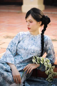 Timeless Grace in Blue Floral Ao Dai and Ancient Architecture-1