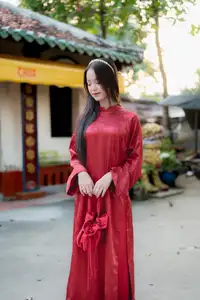 Elegant Vietnamese Beauty in Red Ao Dai: A Glimpse into Traditional Grace-7