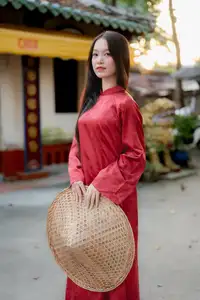 Elegant Vietnamese Beauty in Red Ao Dai: A Glimpse into Traditional Grace-5