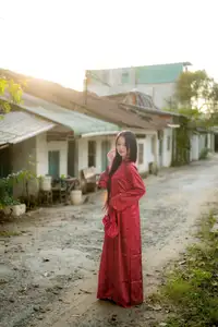 Elegant Vietnamese Beauty in Red Ao Dai: A Glimpse into Traditional Grace-17