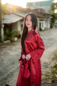 Elegant Vietnamese Beauty in Red Ao Dai: A Glimpse into Traditional Grace-8