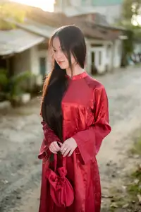 Elegant Vietnamese Beauty in Red Ao Dai: A Glimpse into Traditional Grace-15