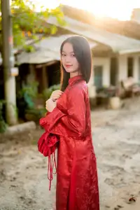 Elegant Vietnamese Beauty in Red Ao Dai: A Glimpse into Traditional Grace-12