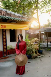Elegant Vietnamese Beauty in Red Ao Dai: A Glimpse into Traditional Grace-13