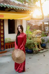 Elegant Vietnamese Beauty in Red Ao Dai: A Glimpse into Traditional Grace-6