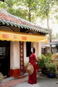 Elegant Vietnamese Beauty in Red Ao Dai: A Glimpse into Traditional Grace-14