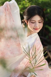 Explore East Asian Traditional Beauty: An Elegant Muse in Soft Pastel Attire.-4
