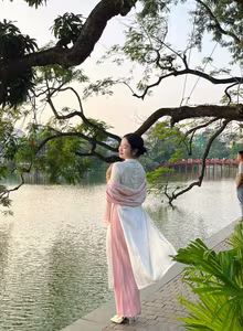 VGU No.148: Radiant Smile in Traditional Ao Dai: Elegant Vietnamese Beauty by the Lake.-7