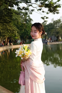 VGU No.148: Radiant Smile in Traditional Ao Dai: Elegant Vietnamese Beauty by the Lake.-9