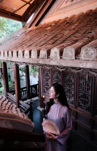 Ethereal Grace in Lavender Ao Dai Amidst Ancient Architecture-7