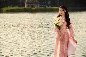 Gentle Vietnamese Beauty: Pink Ao Dai by the Lake, with Pure Lilies-8