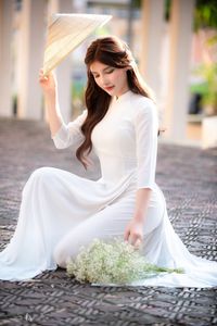 Graceful Vietnamese Girl in Pristine White Ao Dai: Timeless Beauty.-3