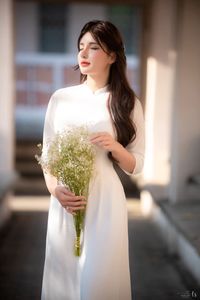 Graceful Vietnamese Girl in Pristine White Ao Dai: Timeless Beauty.-20