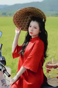 Discover the Serene Beauty: Vietnamese Girl in Red Ao Dai Amidst Green Rice Fields-16