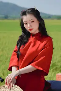 Discover the Serene Beauty: Vietnamese Girl in Red Ao Dai Amidst Green Rice Fields-1