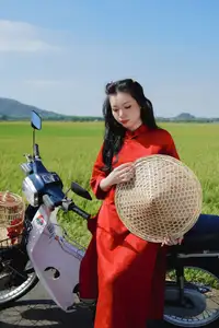 Discover the Serene Beauty: Vietnamese Girl in Red Ao Dai Amidst Green Rice Fields-11