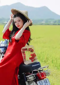 Discover the Serene Beauty: Vietnamese Girl in Red Ao Dai Amidst Green Rice Fields-5