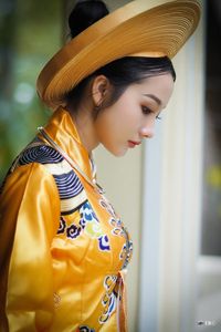 Traditional Vietnamese Beauty: Elegant Lady in Royal Attire & Conical Hat-1