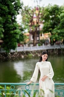 Vietnamese Ao Dai: Elegant Woman by Lake, Traditional HD Photo-1