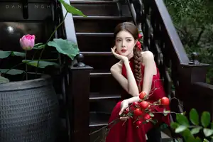 Captivating Asian Girl in Red: Serene Lotus & Rustic Wooden Stairs Scene-0