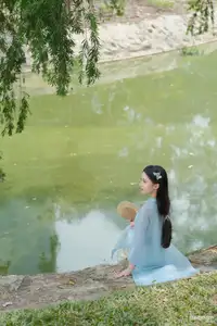 Elegant Vietnamese Maiden in Áo Dài Amidst Serene Nature's Embrace-8