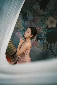 Discover Vietnamese Grace: An Elegant Girl in Ao Yem with a Red Fan.-6