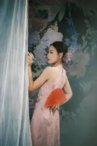 Discover Vietnamese Grace: An Elegant Girl in Ao Yem with a Red Fan.-7