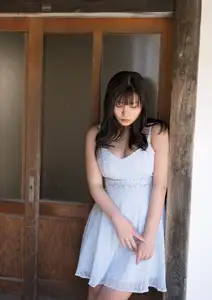 Radiant Beauty on Wooden Steps: A Timeless Moment of Youth-1