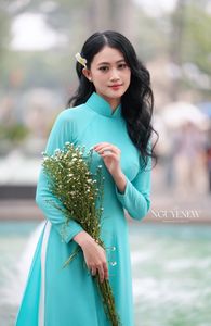 Vietnamese Ao Dai Beauty: Graceful Girl with Flowers.-4