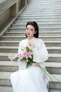Serene Vietnamese Beauty: A Gentle Muse in White with Pink Lilies-3