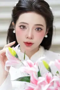 Serene Vietnamese Beauty: A Gentle Muse in White with Pink Lilies-1