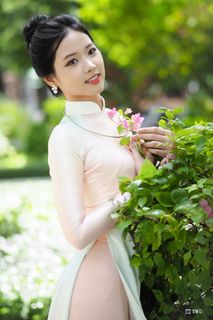 Capturing the Timeless Elegance of Vietnamese Women: A Journey Through Traditional Ao Dai Fashion and Faded Pink Hues-17
